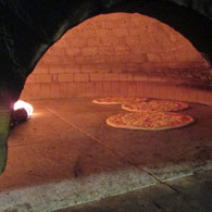 cottura nel forno a legna